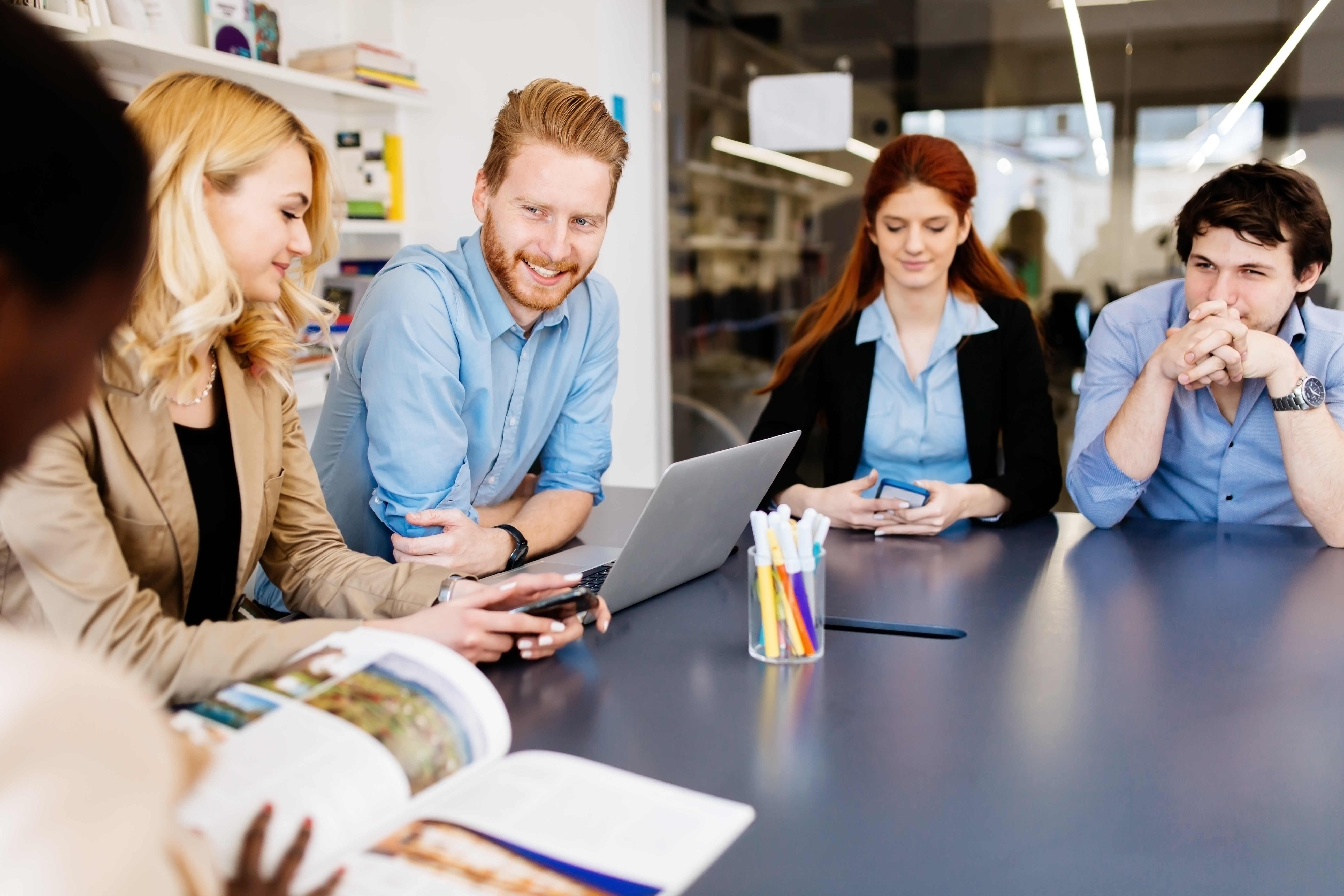 business-people-meeting-and-brainstorming-around-a-2026-01-09-00-15-52-utc